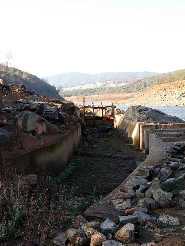 Flume with waterwheel