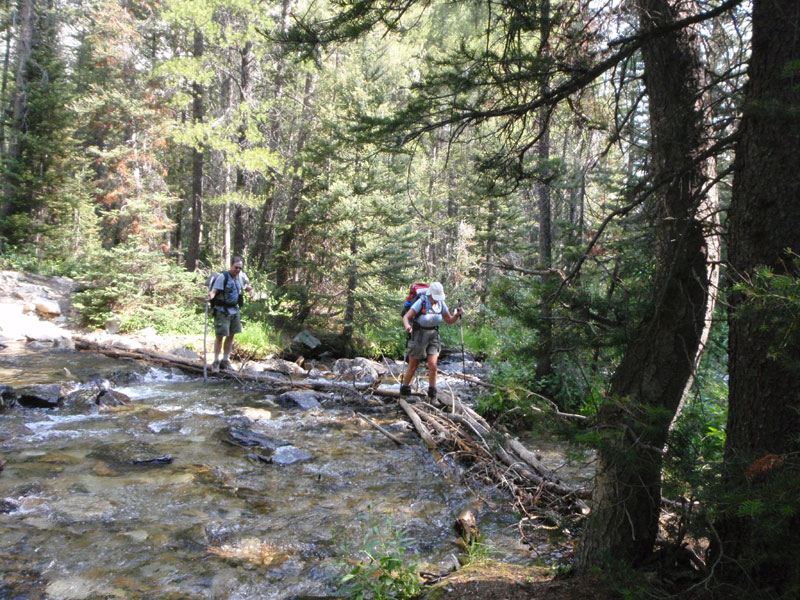 Jan and Rick cross the stream