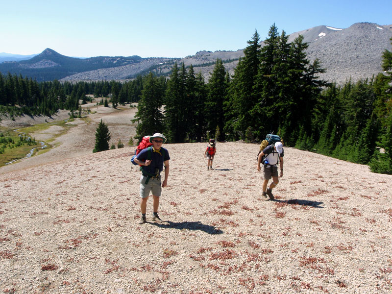 Climbing up the pumi hill to the spring