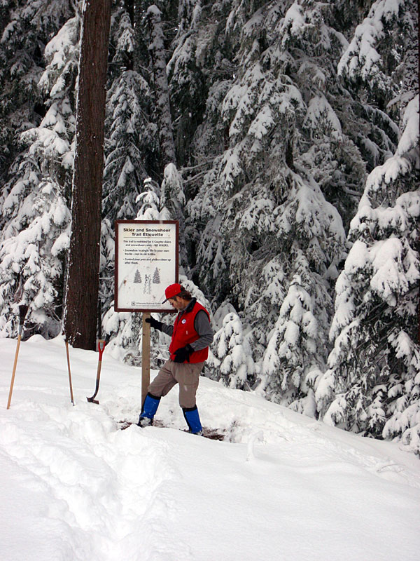 Larry puts up sign at Abernethy Road