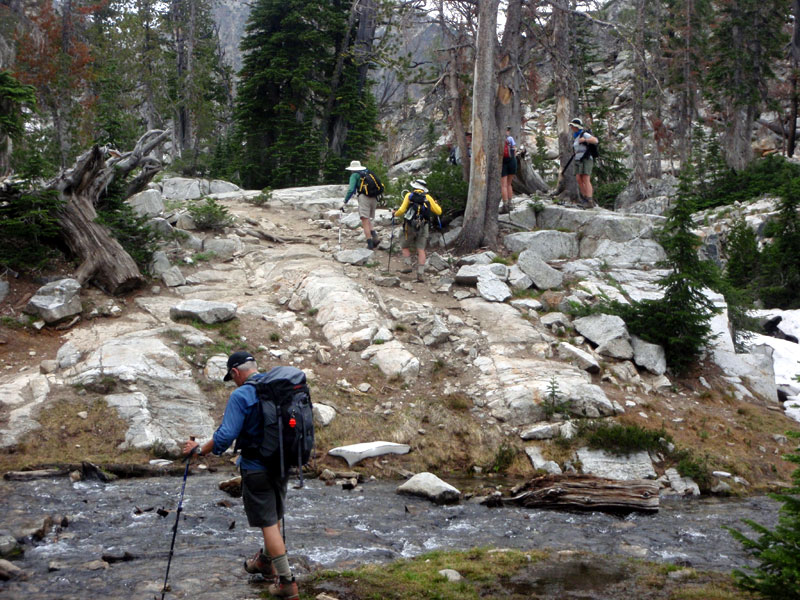 Brian crosses the creek