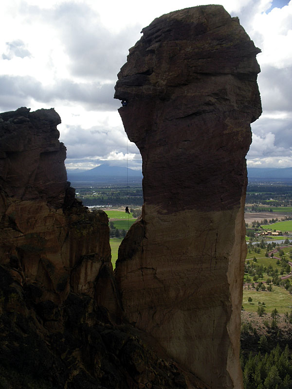 Unknown climber rappels from Monkey Face