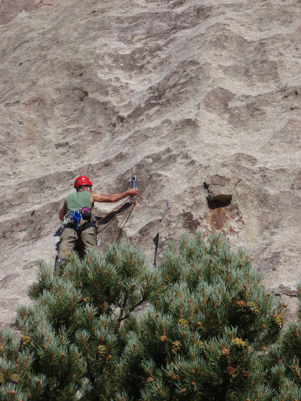 Clipping bolts on Castle Keep. Doug couldn't get past crux on lead, so John finished.