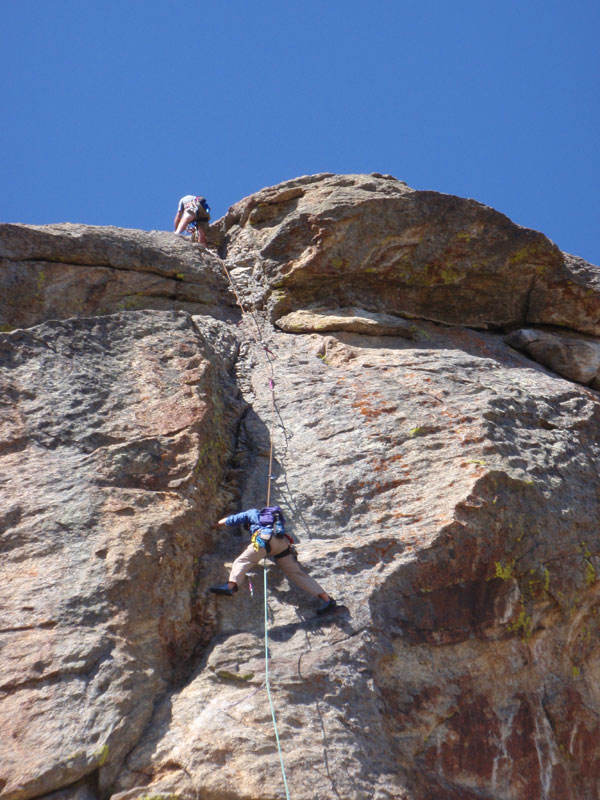 Sue climbs 4th pitch