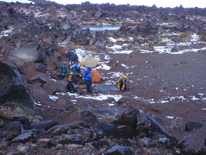 Next morning: most of the snow already melted. Fog cleared about 9 a.m., too late to start climb. Packed up &amp; hiked out.