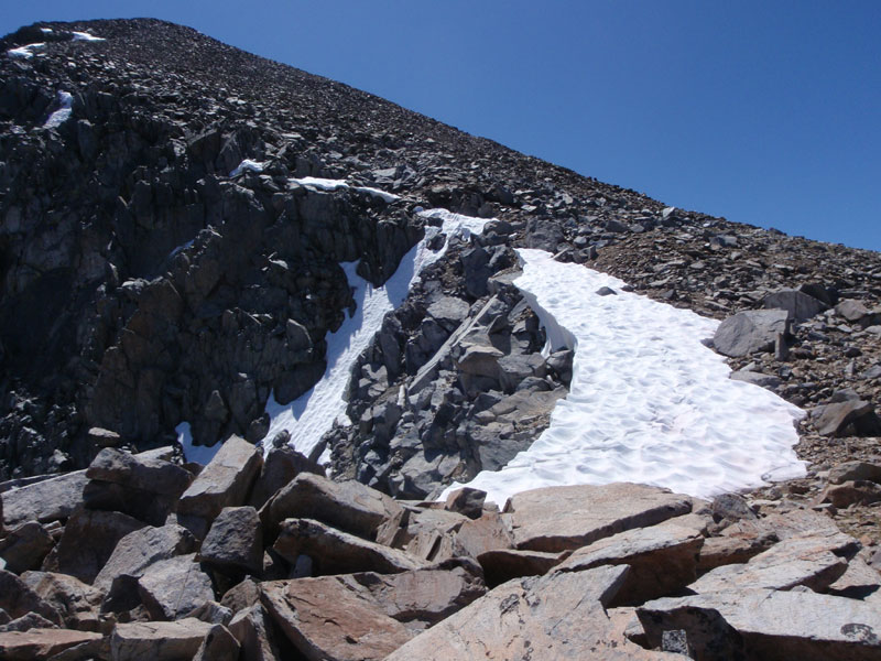 Snow bank at notch in ridge