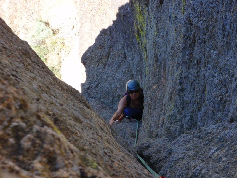 Sue climbs the fifth pitch