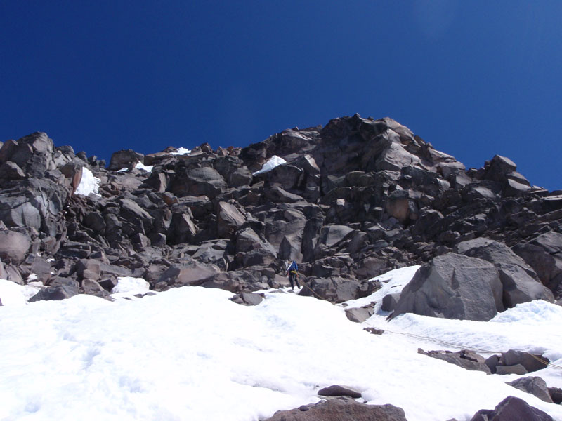 Descending from the summit back to snow