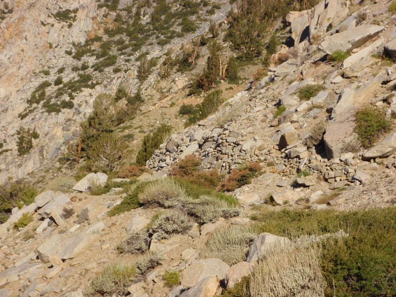 Rock retaining wall. Trail used to be road up to Hanging Valley and Tungstar mines