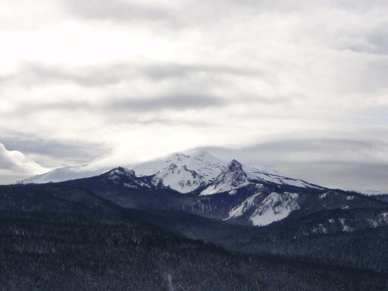 From right to left: Yoran, Myran, and Alsoran (Diamond Peak behind in the clouds)