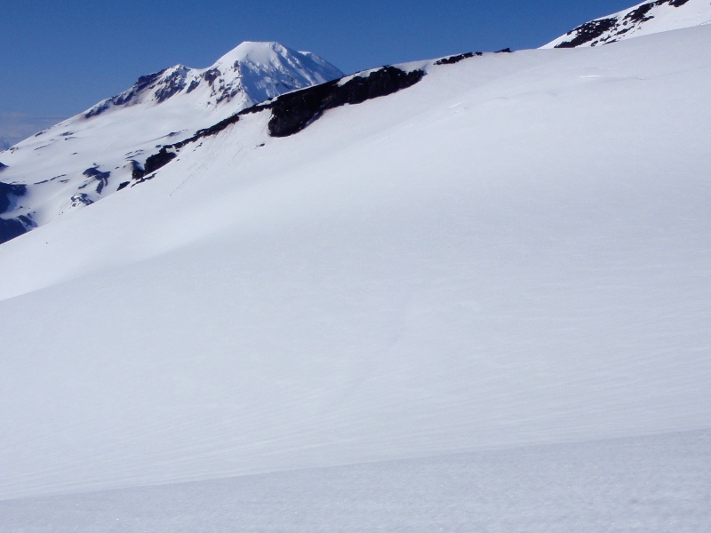 Slight depression in snow shows where crevasse is in middle of the Hayden